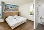 Das Schlafzimmer des behindertengerechtes Ferienhauses fr 8 Personen in Cadzand Bad und Holland